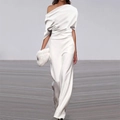 Detail of off-shoulder pleated white jumpsuit with wide-leg trousers and furry clutch bag - White