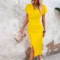 Detail of V-neck wrap dress with side ruching and slit hem in vibrant yellow hue - Yellow