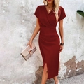 Detail of the elegant deep red V-neck dress featuring sophisticated waist pleats and side slit - Burgundy