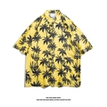 Detail of yellow short-sleeved Hawaiian shirt with black palm tree patterns and white buttons - M / Yellow