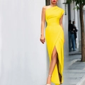 Detail of elegant one-shoulder yellow evening dress featuring a high waist and side slit - Yellow