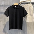 Schwarzes Herren Slim Fit Polohemd mit vertikaler Strickstruktur und kurzen Ärmeln - M / Schwarz