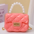 Pink mini jelly bag with quilted pattern, pearl handle and gold chain shoulder strap - Pink