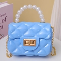 Mini sky blue quilted jelly bag with pearl handle and golden crossbody chain - Sky Blue
