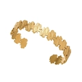 Detail of gold-plated leaf-shaped cuff bracelet featuring a brushed metal texture finish - Gold