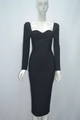 Detail view of the elegant black bodycon dress with sweetheart neckline and shoulder pads - XS / Black
