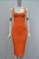 Detail of an orange bandage dress showing the ribbed texture and sweetheart neckline - XS / Orange