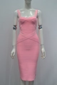 Detailed close-up of pink bandage dress showing high-elasticity ribbed fabric and texture - XS / Pink