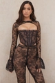 Set due pezzi in pizzo floreale nero con top corto traforato e pantaloni slim a vita alta - XS / Nero
