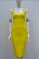 Form-fitting yellow bandage dress with criss-cross straps and geometric texture - XS / Yellow
