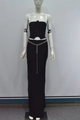 Detailed view of women's two-piece set featuring a metal chain belt on a black skirt - XS / Black and White