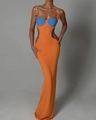 Detail of waist cut-outs and gold heart hardware on orange and blue bandage dress - XS / Orange