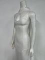 Detailed view of white bodycon evening dress featuring thin straps and deep U-neckline - XS / White