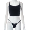 Close-up of black ribbed crop top and thong set featuring delicate lace trim details - L / Black
