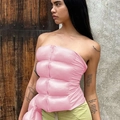Detail of pink quilted strapless vest showing metallic zipper and puffy texture - S / Pink