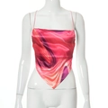 Detail of satin bandana top featuring vibrant pink marble print and sleek silk-like texture - Red