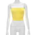 Close-up of bright yellow slim fit tube top fabric on a mannequin with clean stitching - M / Yellow