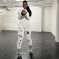 White slim fit long sleeve ribbed jumpsuit with distressed cutout detailing for women - S / White