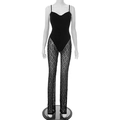 Close-up of sheer floral lace fabric and heart-shaped neckline on a black jumpsuit - S / Black