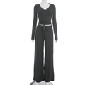 Detalle de conjunto negro con top corto con cuello en V y pantalón con cordón - S / gris oscuro