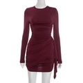 Detailed view of wine red bodycon mini dress with ruched fabric and asymmetrical hem - S / Burgundy