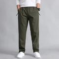 Men's cotton cargo pants in army green featuring elastic waist and straight-leg fit - M / Army Green