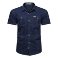 Detail of dark blue men's cargo shirt featuring dual chest pockets and leather label - Dark Blue