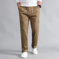 Men's khaki cargo pants with multiple pockets and elastic waist in a relaxed fit - Khaki/Earth Yellow