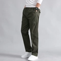 Men's military green cargo pants with multi-pocket design and slim straight cut fit - Army Green
