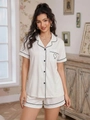 Women's white short sleeve pajama set with black contrast piping and heart pocket detail - S / White