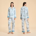 Pigiama azzurro con stampa floreale e uccelli, maniche lunghe e bordi a contrasto - S / Nibbio Blu Floreale