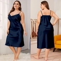 Close-up of navy blue satin nightdress with glossy silk texture and adjustable straps - Navy Blue