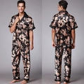 Men's black satin pajama set with golden dragon print featuring short sleeves and long pants - L / Black