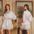 Champagne satin robe with floral embroidery and matching belt in elegant indoor setting - Champagne Embroidery