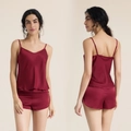 Women's burgundy satin pajama set featuring camisole and shorts with a silky finish - S / Burgundy