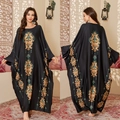 Elegant black satin Abaya with gold baroque floral prints in an oversized long sleeve design - One Size / Emerald Treasure