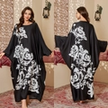 Elegant black satin kaftan nightdress with white floral prints and wide batwing sleeves - One Size / Night Rose