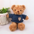 Brown teddy bear plush toy wearing a dark blue knit sweater with small bear label - Dark Brown (Blue Sweater)