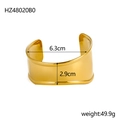 Polished gold wide cuff bracelet with 2.9cm width and minimalist hollow design - Gold