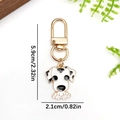 Dalmatian dog print metal keychain in gold finish with measurements and green leaves - Black White Dalmatian Style (ER1914)