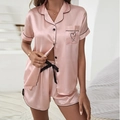 Pyjama deux pièces rose en satin de soie pour femme avec manches courtes et liseré noir - Rose