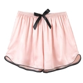 Women's pink ice silk pajama shorts with black bow and satin trim in minimalist style - Pink