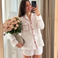 Women's two-piece white cotton pajama set with red piping and button-up long sleeves - M / White
