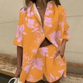 Completo due pezzi arancione da donna con stampa floreale rosa, camicia e shorts - S / Foglia tropicale arancione