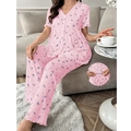 Detail of floral loungewear showing ribbed fabric texture and wavy lettuce edge cuffs - Foundation Color
