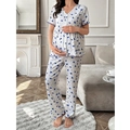 Detail of floral maternity pajamas with V-neck, blue ruffled edges, and high waist design - Blue