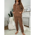 Detailed texture of thick plush brown pajama set featuring white stripes and warm fleece fabric - S / Brown