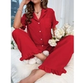 Women's two-piece red pajama set with short-sleeve lace top and long trousers in a bedroom - S / Top And Bottom / Red