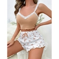 Detail view of floral pajama set featuring lace-trim camisole and ribbed shorts - S / Yellow Flower
