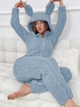 Detail of light blue fleece jumpsuit with 3D bunny ears hood and embossed bear texture - Light Blue